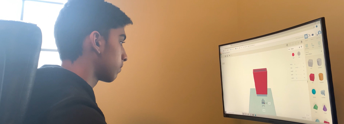 Student looking at a monitor 