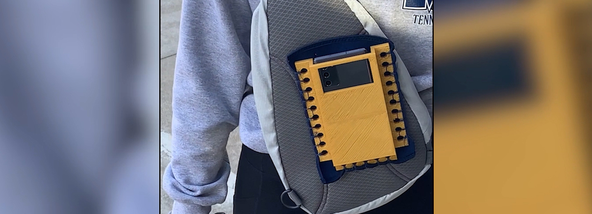 Student carrying a backpack