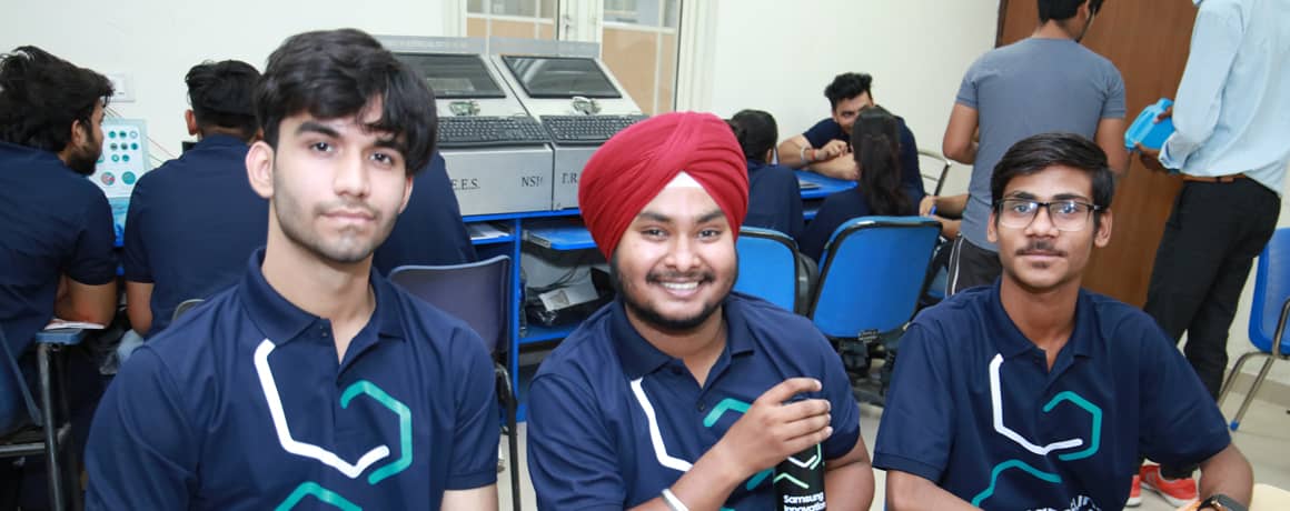 Three Indian students in a team