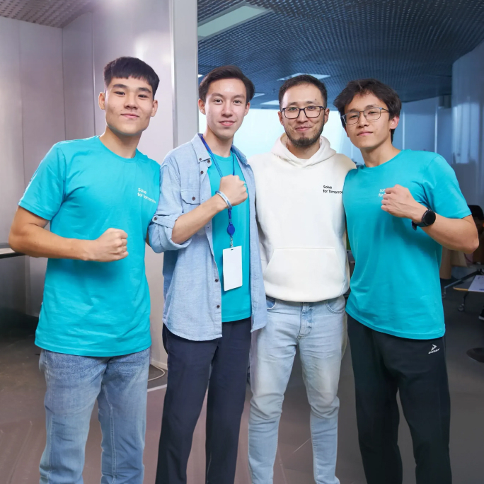 Beelieve team is taking a picture with Samsung mentor (Left to right Adilet Dauleti, Zhangerey Bekbulat, Berik Umarov - Samsung, Amirkhan Aidarkhan)