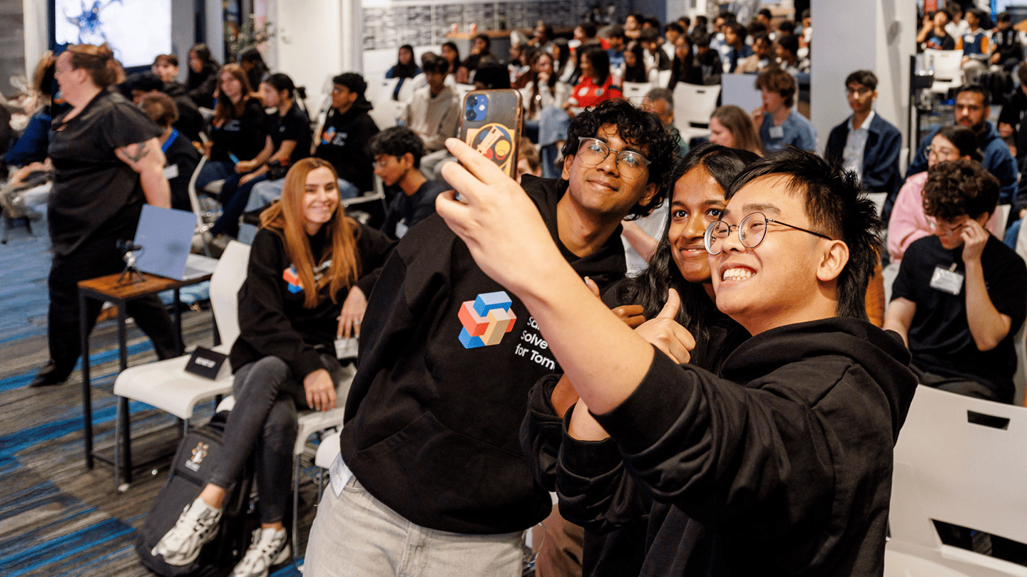 Students participating in the Samsung Solve for Tomorrow Finale event in Canada are taking a selfie together.