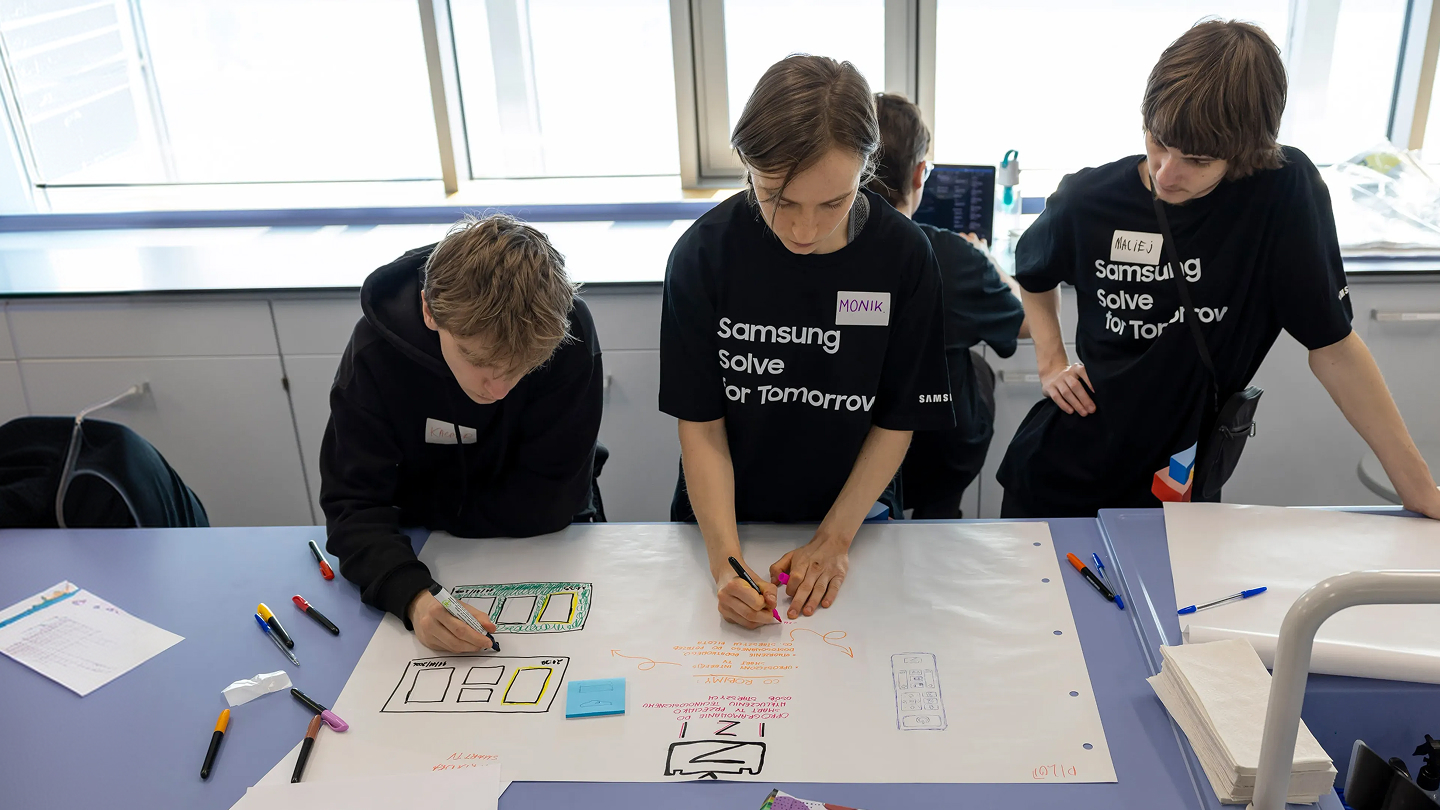 Students participating in Samsung Solve for Tomorrow are demonstrating their projects in front of judges.