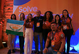 The Jessi team is taking a commemorative photo on the stage after winning on the Samsung Solve for Tomorrow Brazil.